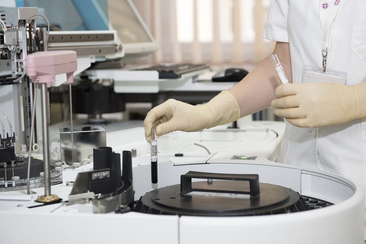 laboratory worker handling test tube