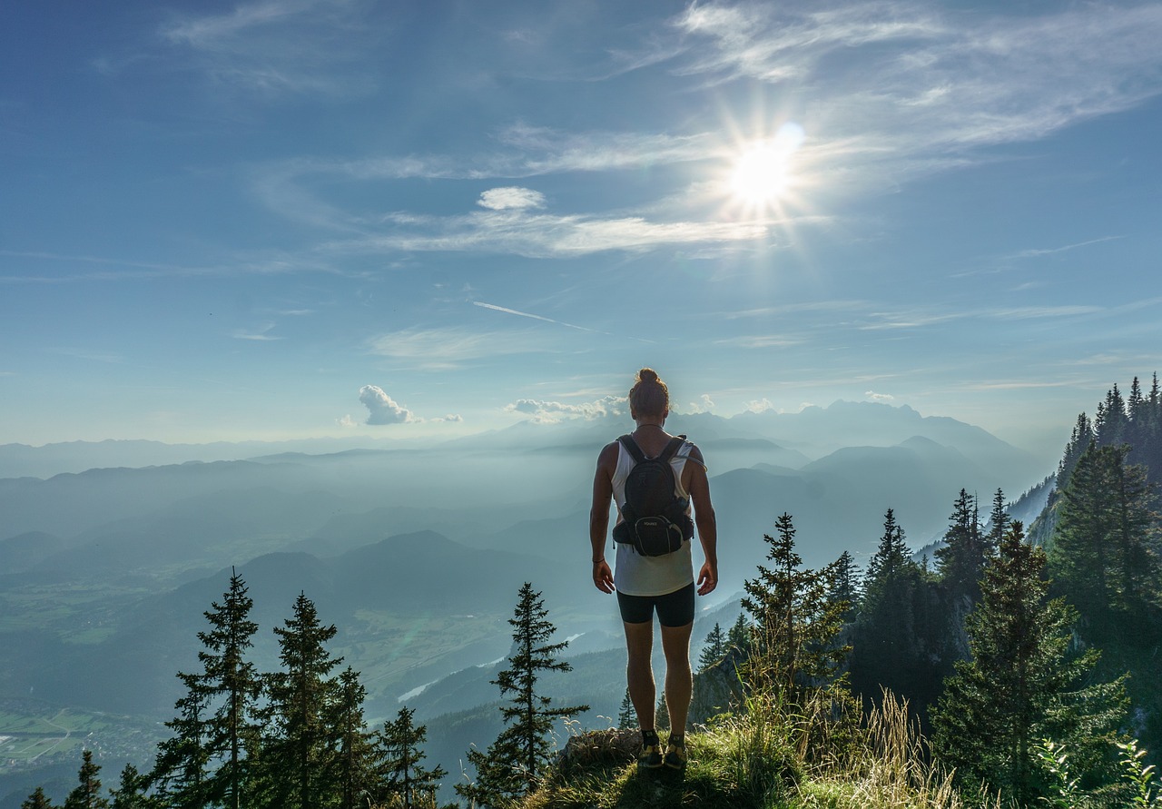 woman overlooking mountain range