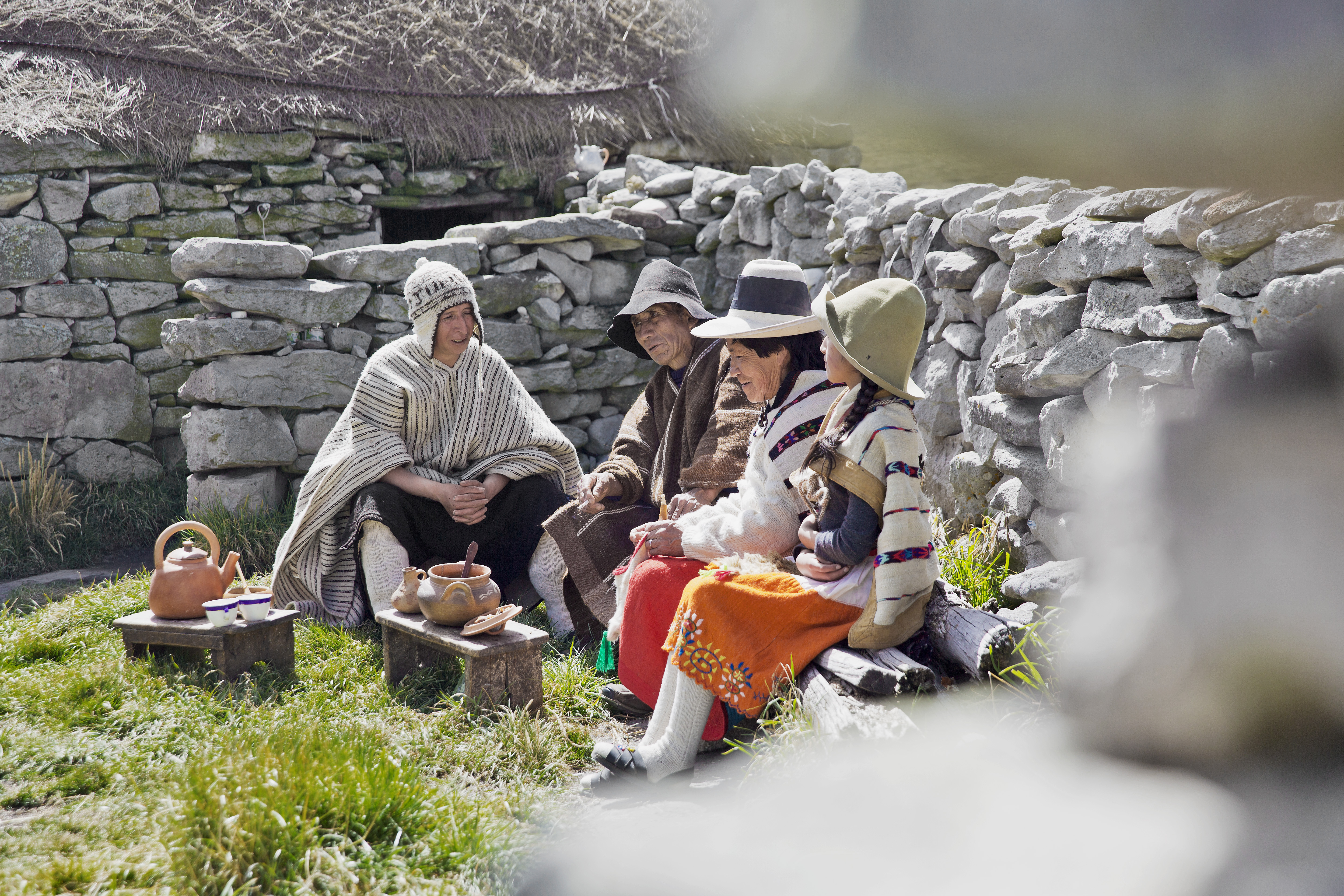 Indigenous Peruvians preparing mazamorra de maca