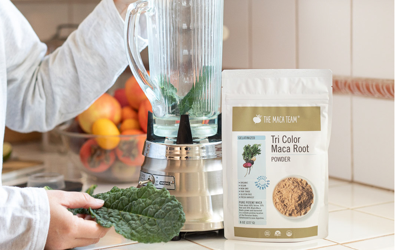 Gelatinized tri-color maca powder being added to a blender