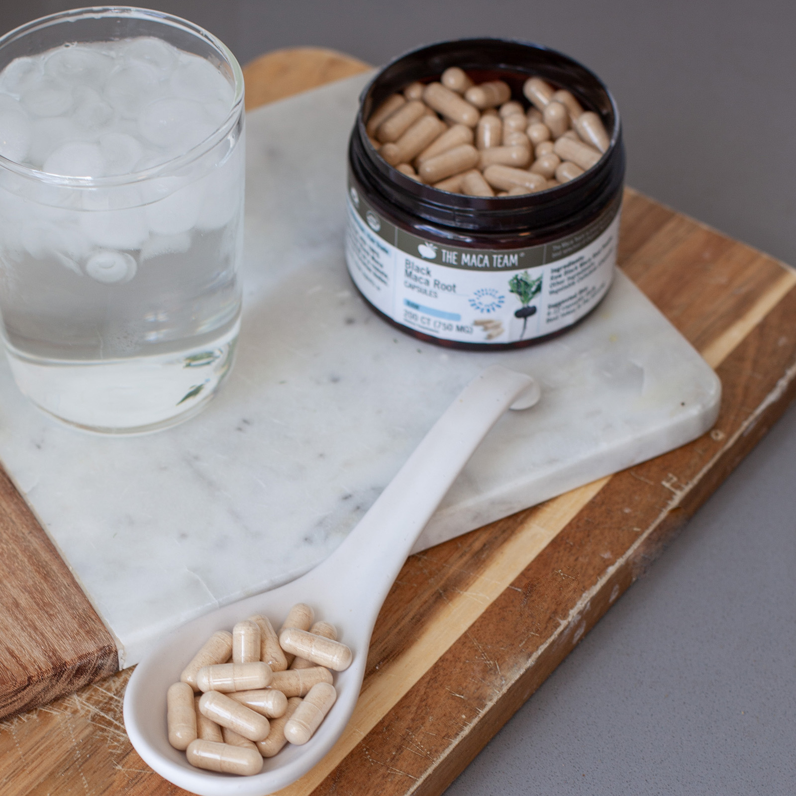 Organic Raw Black Maca Capsules with water