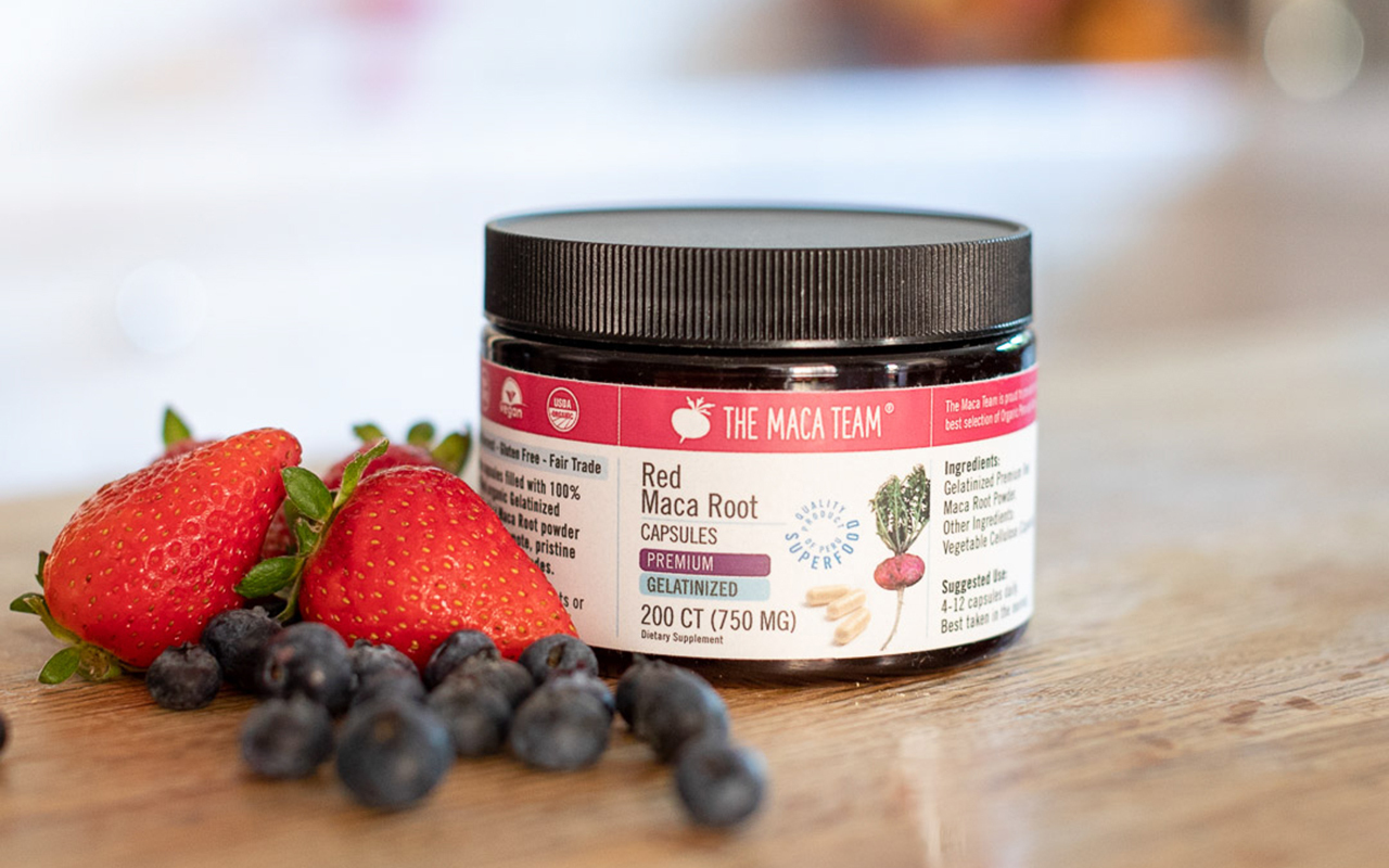 Raw red maca capsules in an everyday setting