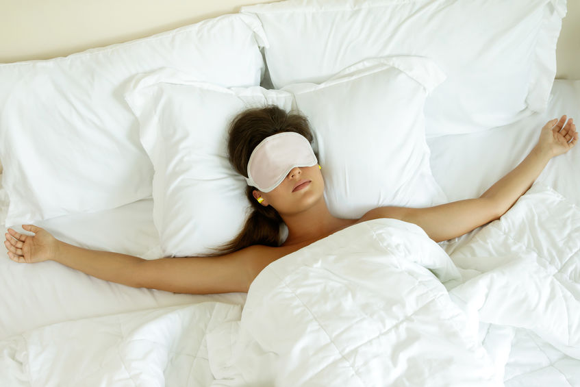 Woman sleeping while considering whether maca can affect sleep
