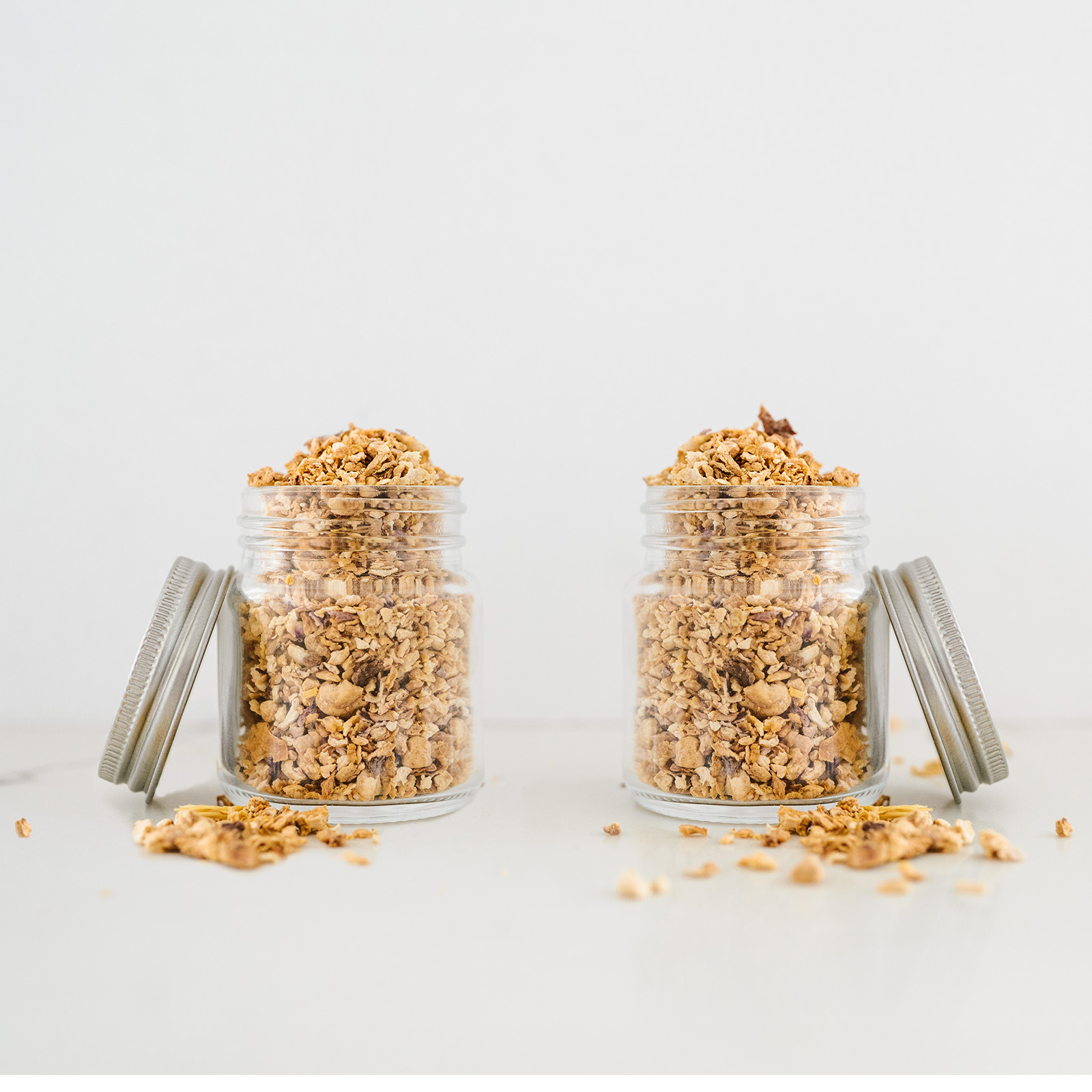Whole maca root chips stored in glass jars